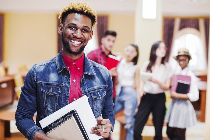 cheerful-man-classroom-posing-camera
