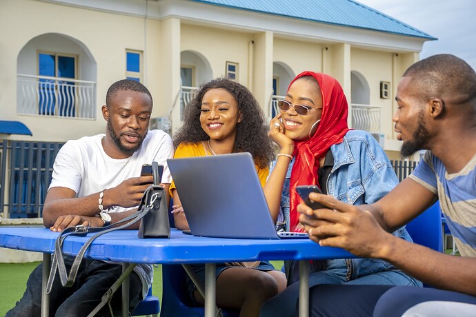 group-young-african-people-hanging-out-outdoor-cafe